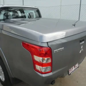 Mitsubishi Triton fitted with a 1-piece EGR Hard Lid for secure tub storage.