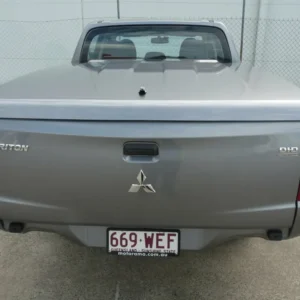 Rear view of Mitsubishi Triton with EGR Hard Lid – 3 Piece tub cover.
