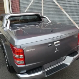 Mitsubishi Triton fitted with EGR Hard Lid – 3 Piece and OEM sports bars.