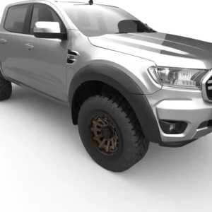 Silver Ford pickup truck with white fender flares, off-road tires, and bronze alloy rims
