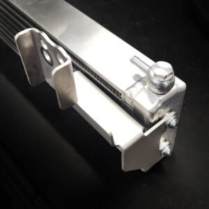 Close-up of Nissan Navara NP300 transmission cooler kit with precision mounting bracket and fittings