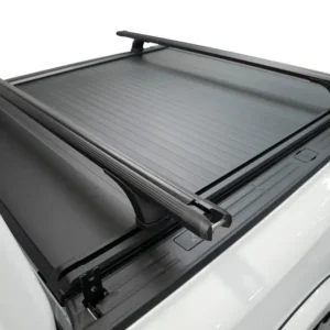 EGR roof rack cross bars installed on a ute with a RollTrac retractable tonneau cover