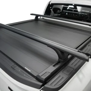 EGR roof rack cross bars mounted on a white ute with RollTrac retractable tonneau cover, rear view