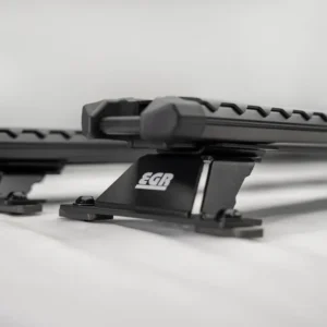 Close-up of EGR canopy roof rack crossbars with heavy-duty mounting brackets