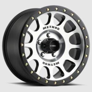 Method Race Wheels 305 NV machined face with matte black lip and beadlock-style rivets angled view