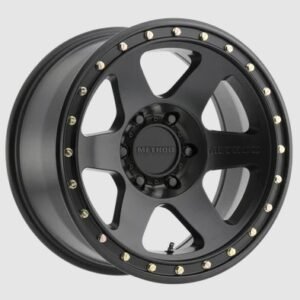 Method Race Wheels 310 Con 6 matte black alloy wheel angled view with simulated beadlock lip and gold bolts