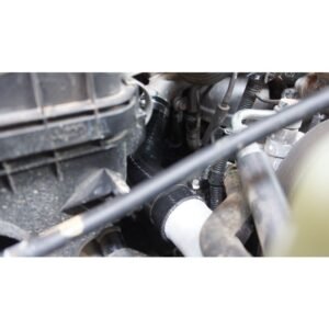 Complete Intercooler Kit with Piping and Installation Hardware Installed intercooler piping and silicone hose in turbocharged engine bay