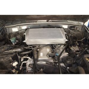 Toyota Landcruiser 80 Series 1HD-FT 24V top mount intercooler upgrade installed in engine bay