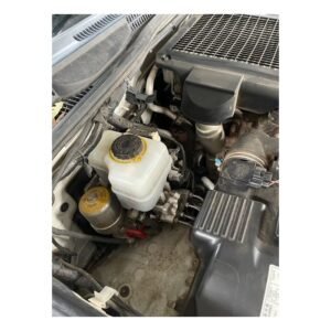 Toyota Prado 120 Series engine bay showing catch can mounting location