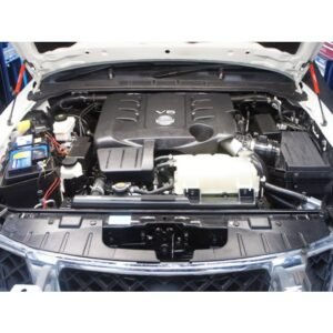 Nissan V6 engine bay with factory components and wiring layout