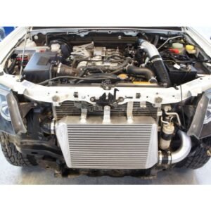 Toyota Land Cruiser 1VD-FTV V8 front mount intercooler upgrade installed in engine bay