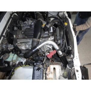 Toyota Hilux 3.0L 1KZ-TE engine bay with HPD front-mount intercooler kit installed