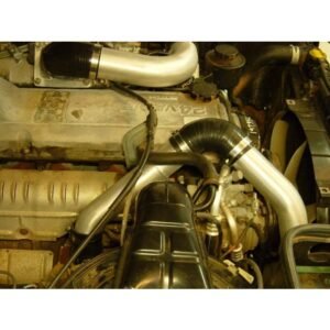 Toyota Landcruiser 80 Series 1HZ engine bay with HPD front mount intercooler kit installed.