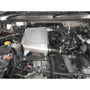 High-performance top-mount intercooler installed on turbo diesel engine