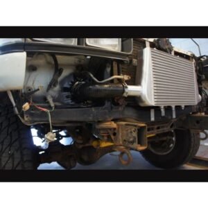 HPD Series 2 Toyota Landcruiser 80 Series Front Mount Intercooler Kit Side view of HPD front mount intercooler installed on Toyota Landcruiser 80 Series.