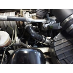 Intercooler piping and silicone hose connection inside vehicle engine bay