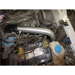 Engine bay with aluminium intercooler piping connected to turbo system