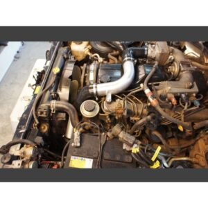 Toyota Landcruiser 70 Series 1HDFTE engine bay with HPD front mount intercooler piping installed.