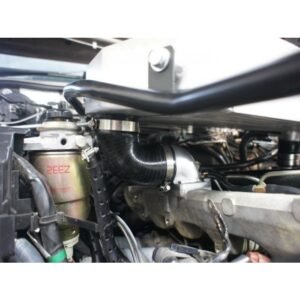 Close-up of Nissan Patrol engine bay with aftermarket intercooler piping