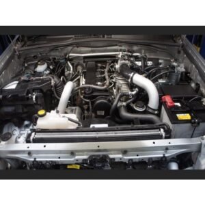 Toyota Prado 120 Series D4D 3.0L engine bay with upgraded intercooler piping installed