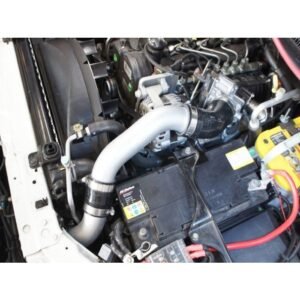 Holden Colorado 2.8L Turbo Diesel engine bay with aftermarket intercooler piping and battery setup