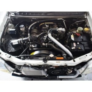 Engine bay with full front-mount intercooler kit and piping installed