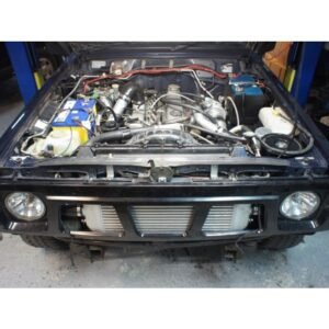 Nissan Patrol GQ TD42 engine bay with front mount intercooler visible through grille