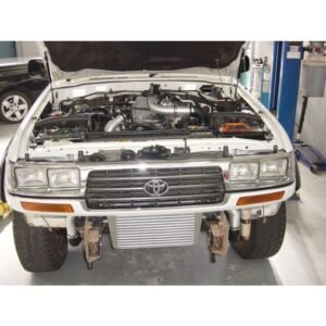 Toyota Landcruiser 80 Series 1HD-FT Front Mount Intercooler Kit Toyota Landcruiser 80 Series 1HD-FT front view with front mount intercooler installed