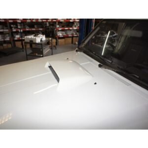 Nissan Patrol bonnet with aftermarket hood scoop for top-mount intercooler.