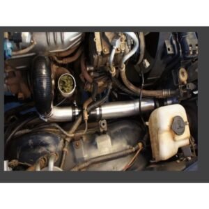 Toyota Landcruiser 70 Series 1HDFTE engine bay showing HPD Series 2 intercooler piping and hose connections.