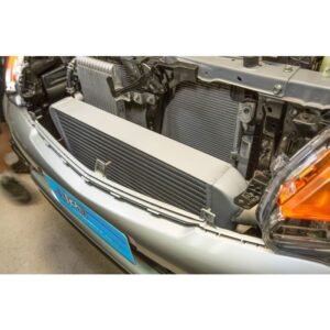 HPD intercooler installed behind vehicle bumper with radiator visible.