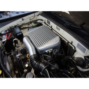 Toyota Hilux engine bay with performance top-mounted intercooler and alloy piping
