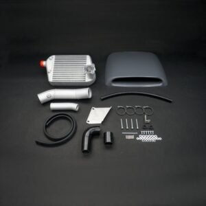 Toyota Hilux top-mount intercooler kit with hood scoop, piping, and installation hardware