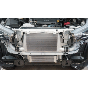 Toyota Hilux/Fortuner 1GD 2.8L transmission cooler kit fully installed behind the front bumper.