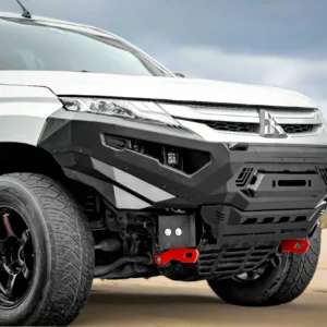 Mitsubishi Triton MR 2019–2023 fitted with Spartan bull bar and red recovery points on sandy terrain