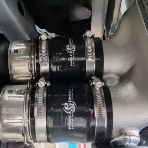 Close-up view of Process West intercooler piping with silicone joiners and clamps installed on a Next Gen Ranger Raptor.