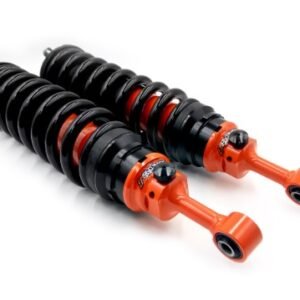 Pair of adjustable bypass suspension shock absorbers with black coil springs and orange bodies on white background