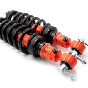 Outback Armour GVM upgrade adjustable bypass front struts with heavy-duty coil springs for 4x4 suspension.