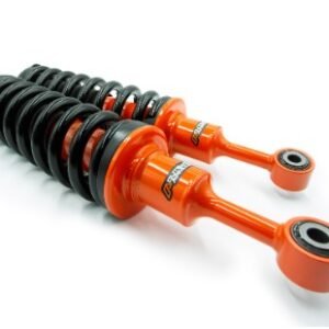 Outback Armour heavy-duty suspension shock absorbers with coil springs – orange and black automotive shocks