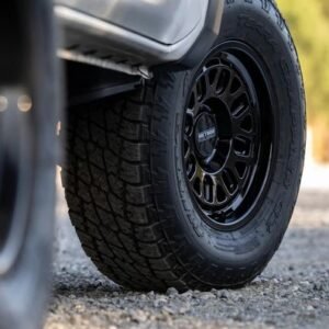 Close-up of Method 321 gloss black wheel with all-terrain tyre fitted to 4x4 vehicle