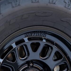 Method 321 gloss black wheel close-up showing Method branding and multi-spoke detail